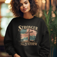 STRONGER THAN THE STORM Heavy Weight Patriotic Christian Sweatshirt (S-5XL):  Women's Gildan 18000 - FREE SHIPPING